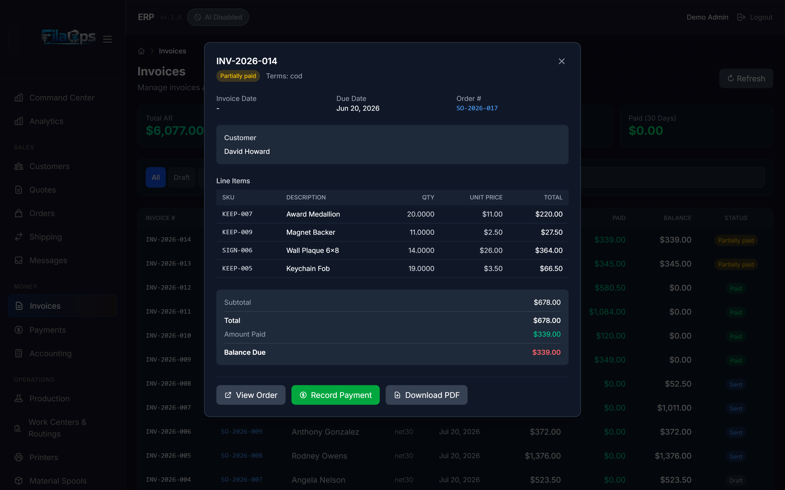 Invoice detail panel open over the invoices list, showing customer info, line items table, totals block, and action buttons: View Order, Mark Sent, Record Payment, Download PDF